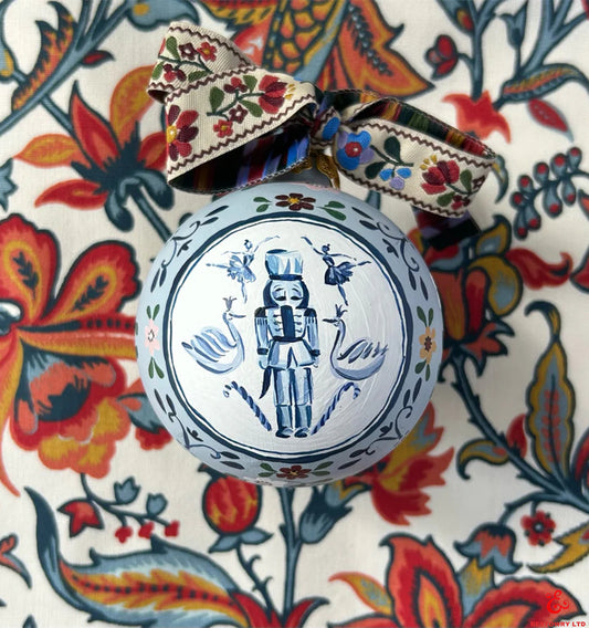 Hand-painted floral nutcracker decoration