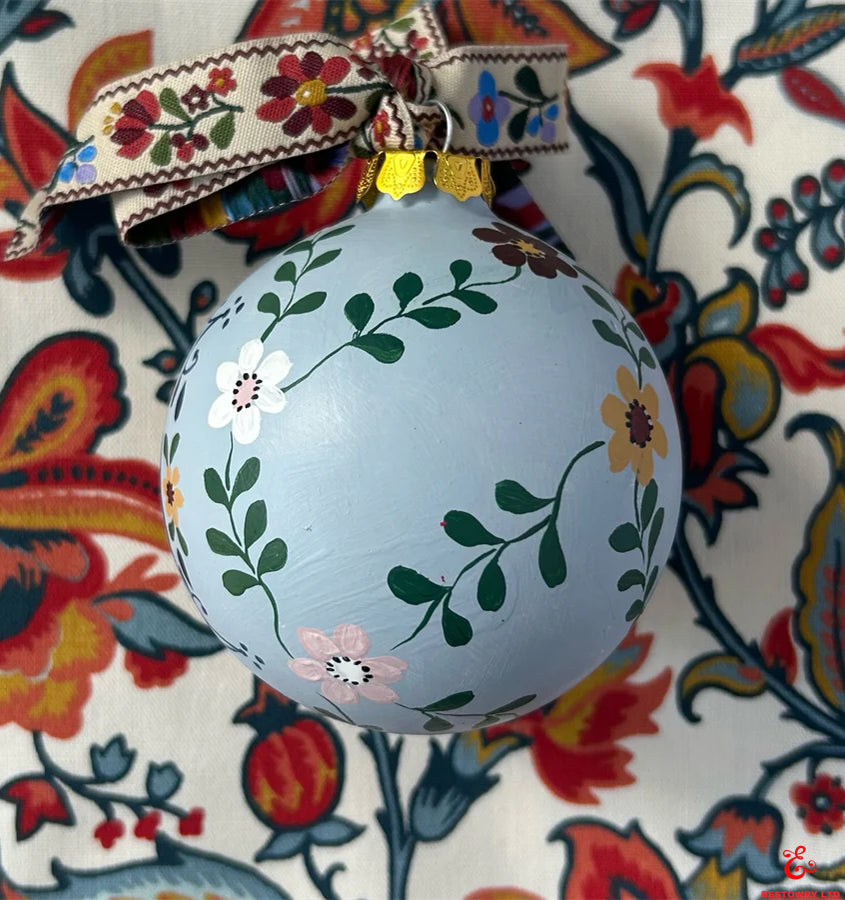Hand-painted floral nutcracker decoration