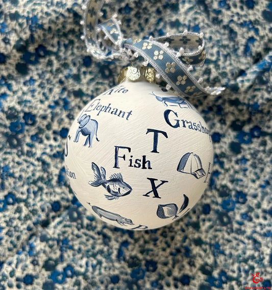 Hand-painted blue and white letter decoration