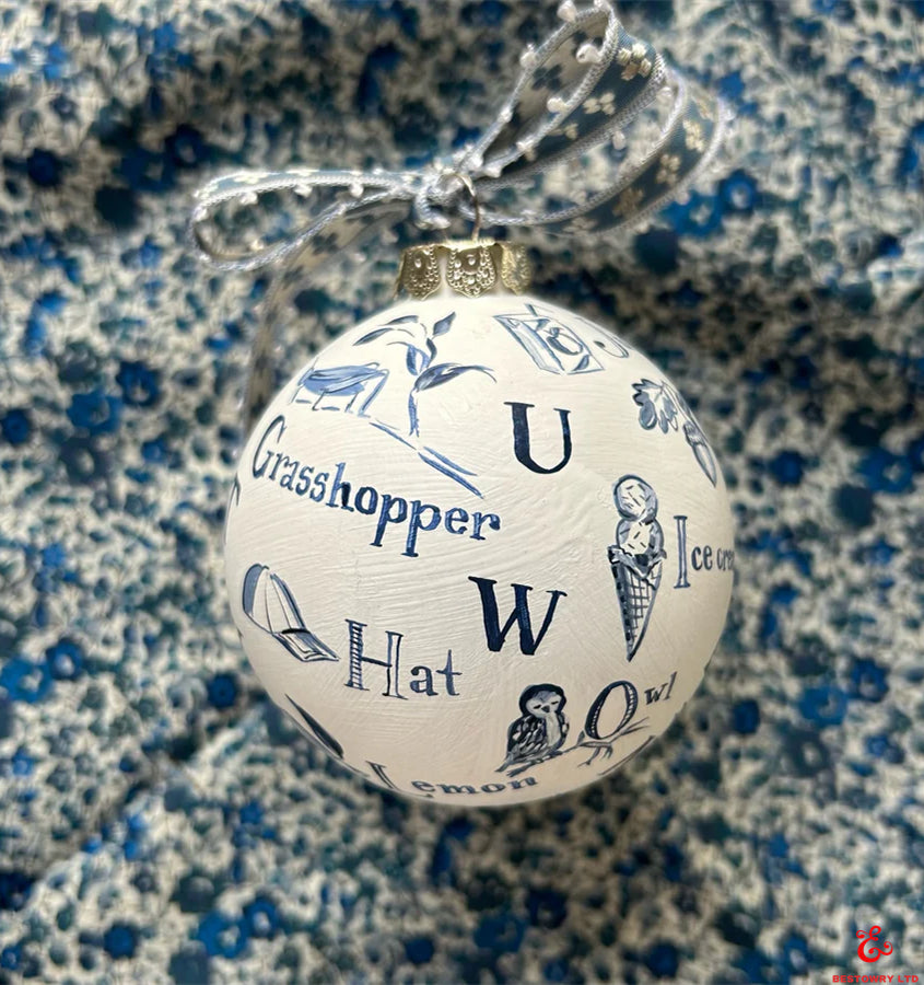Hand-painted blue and white letter decoration